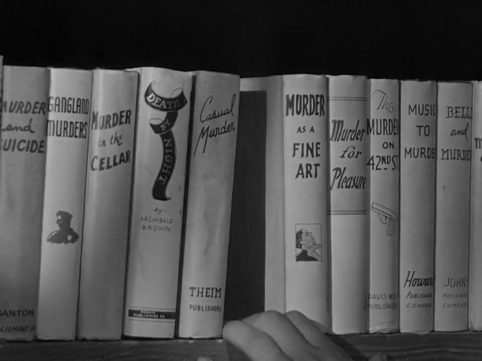 Mystery books on a shelf